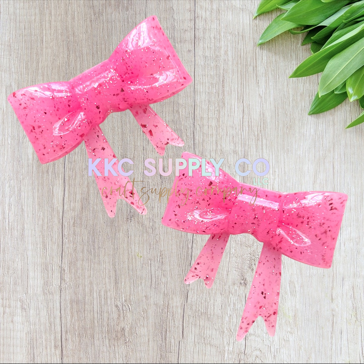 SGL71-Pretty Pink Liquid (with darker pink) Confetti Glitter Large Bow Silicone Focal Bead