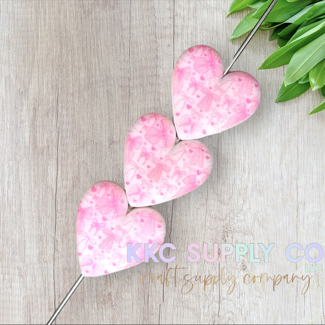 Coquette Bow Glitter Printed Heart Silicone Focal Bead