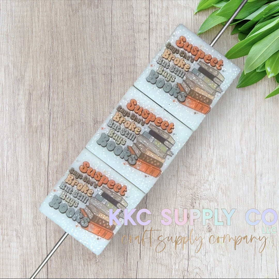 Suspect Says She’s Broke But Still Buys Books Glitter Printed Silicone Focal Bead