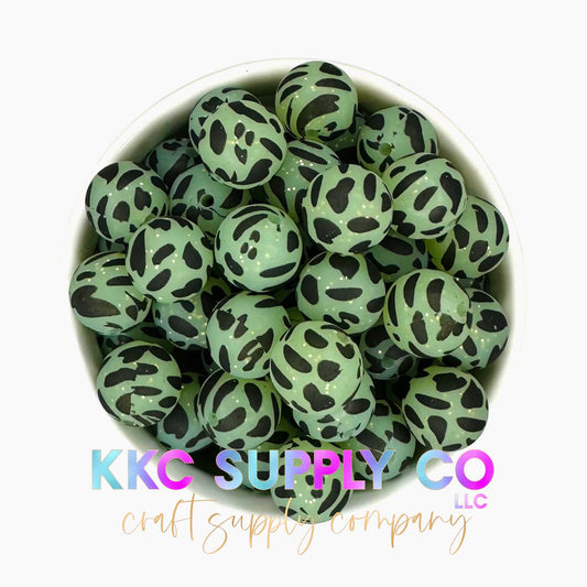 SP77-Glitter Cow Print Teal/Light Green and Black 15mm Silicone Beads