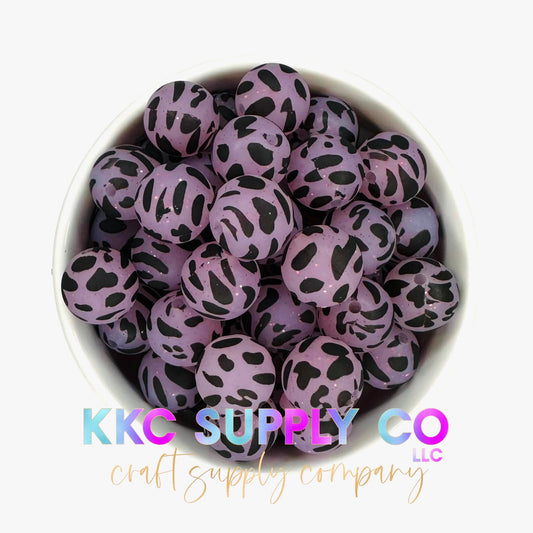 SP76-Glitter Cow Print Lavender and Black 15mm Silicone Beads