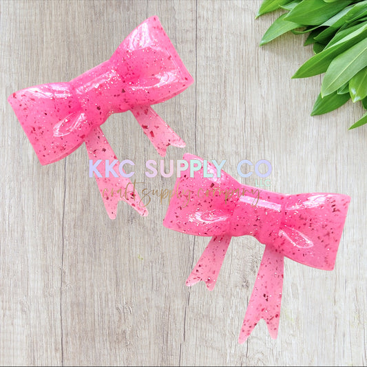 SGL71-Pretty Pink Liquid (with darker pink) Confetti Glitter Large Bow Silicone Focal Bead