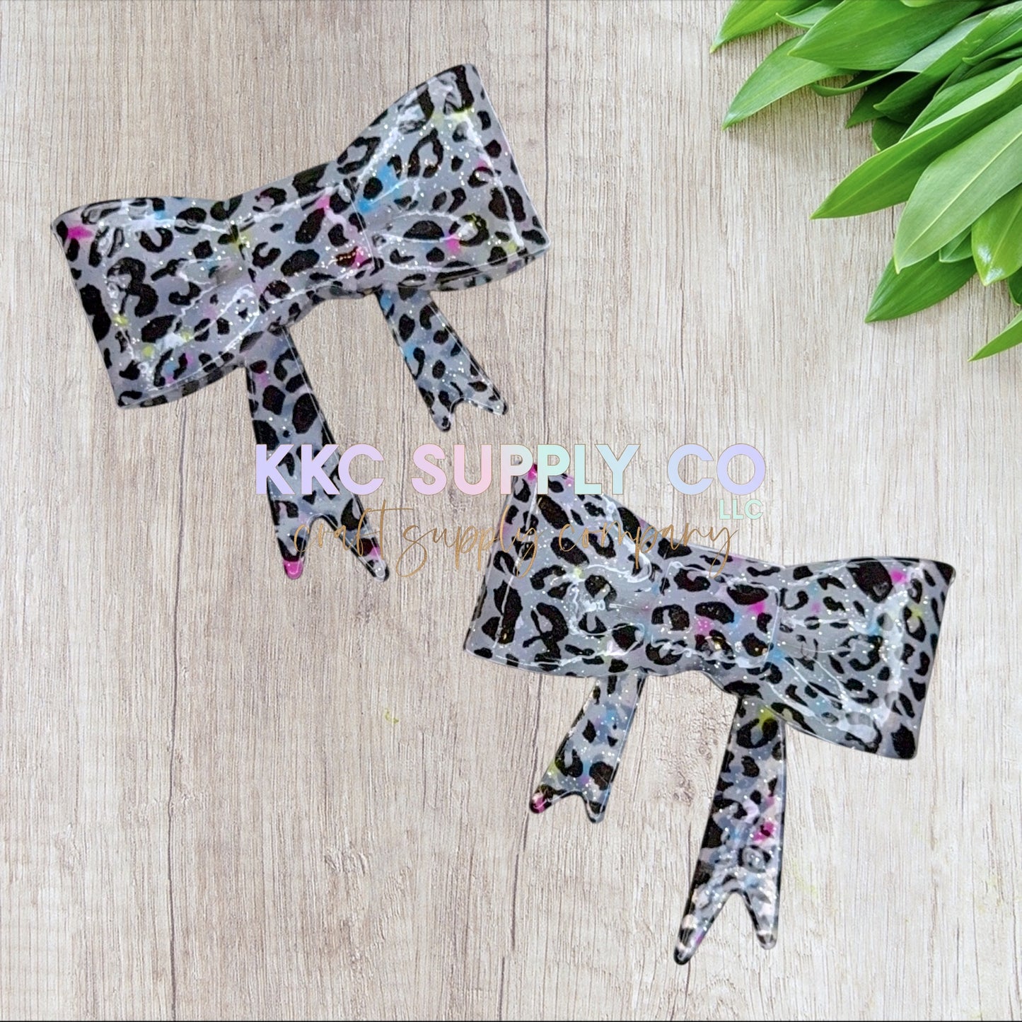 SGL60-White with Neon Confetti Leopard Liquid Glitter Large Bow Silicone Focal Bead