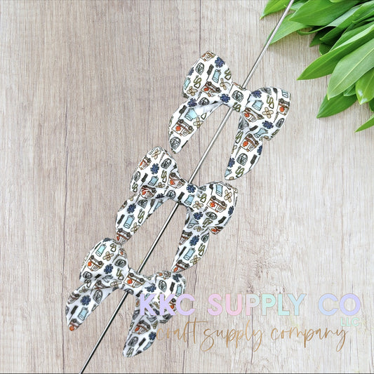 SP262-First Aid Bow Silicone Focal Bead