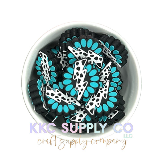 Turquoise Cow Print Lightening Bolt Silicone Focal Bead-Teal