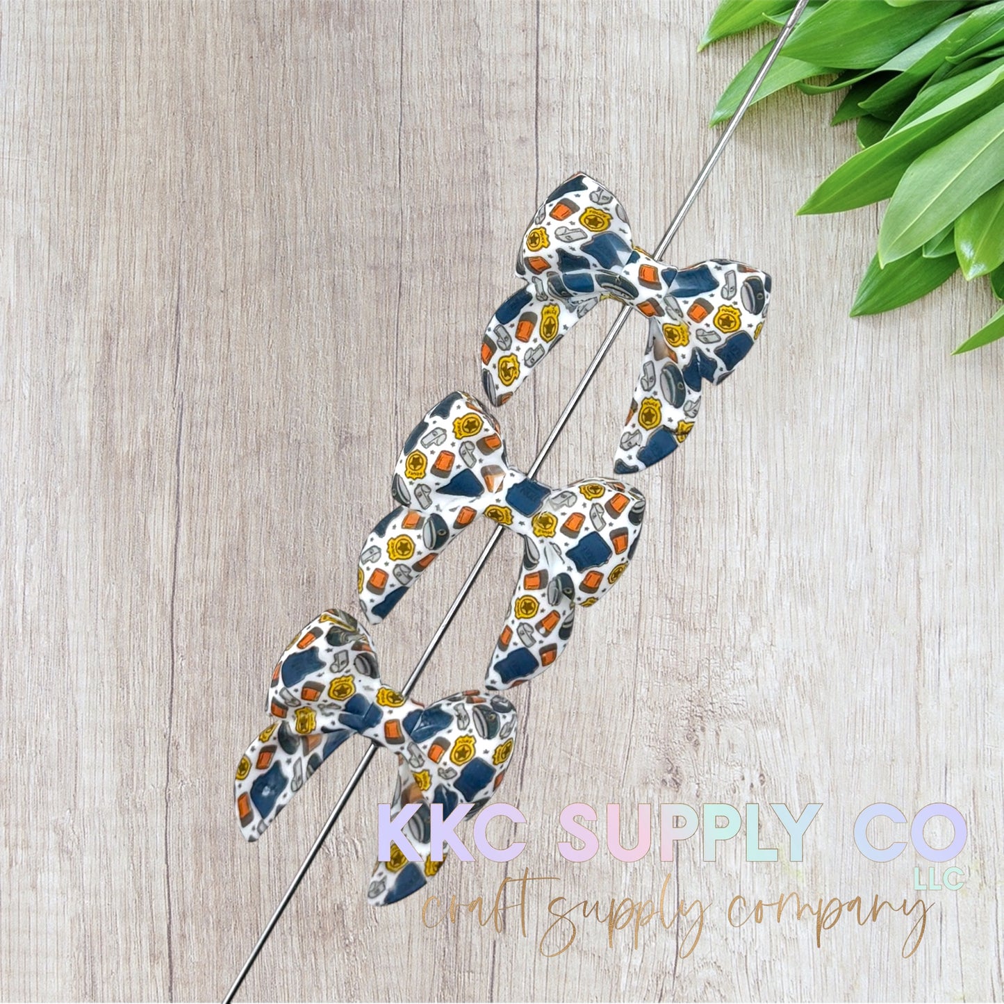 SP264-Police Bow Silicone Focal Bead